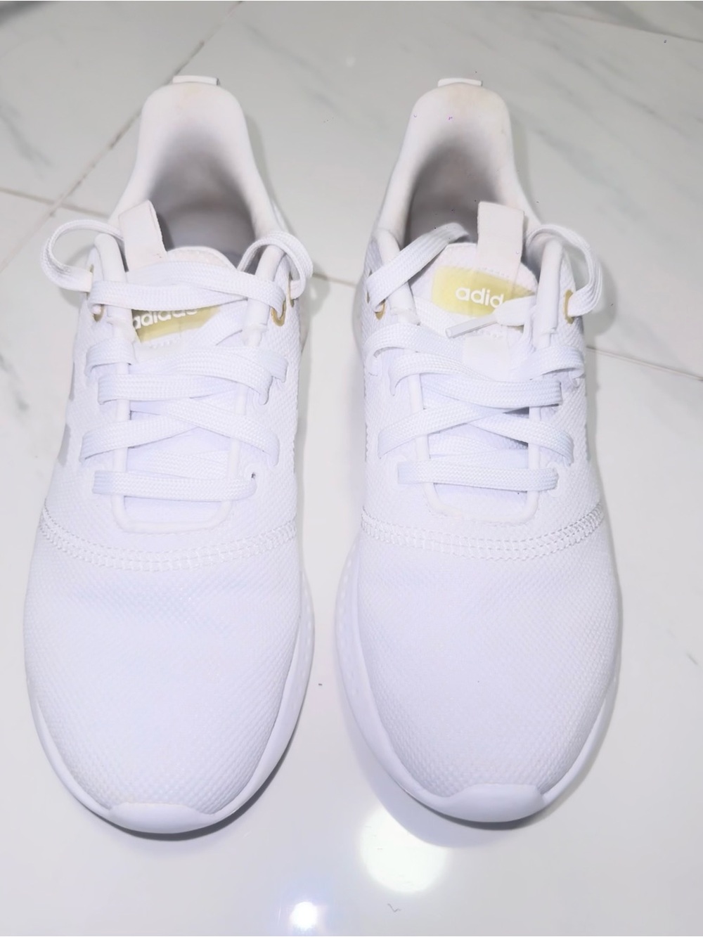 adidas White Men’s Lightweight Knit Sneakers with Gold Accent